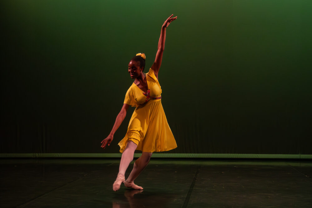 Tami performing a solo ballet piece in dance school.