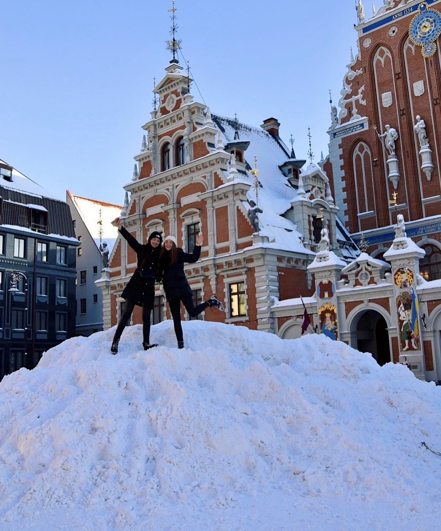 Liz and a friend at House of Black Heads, Riga, Latvia