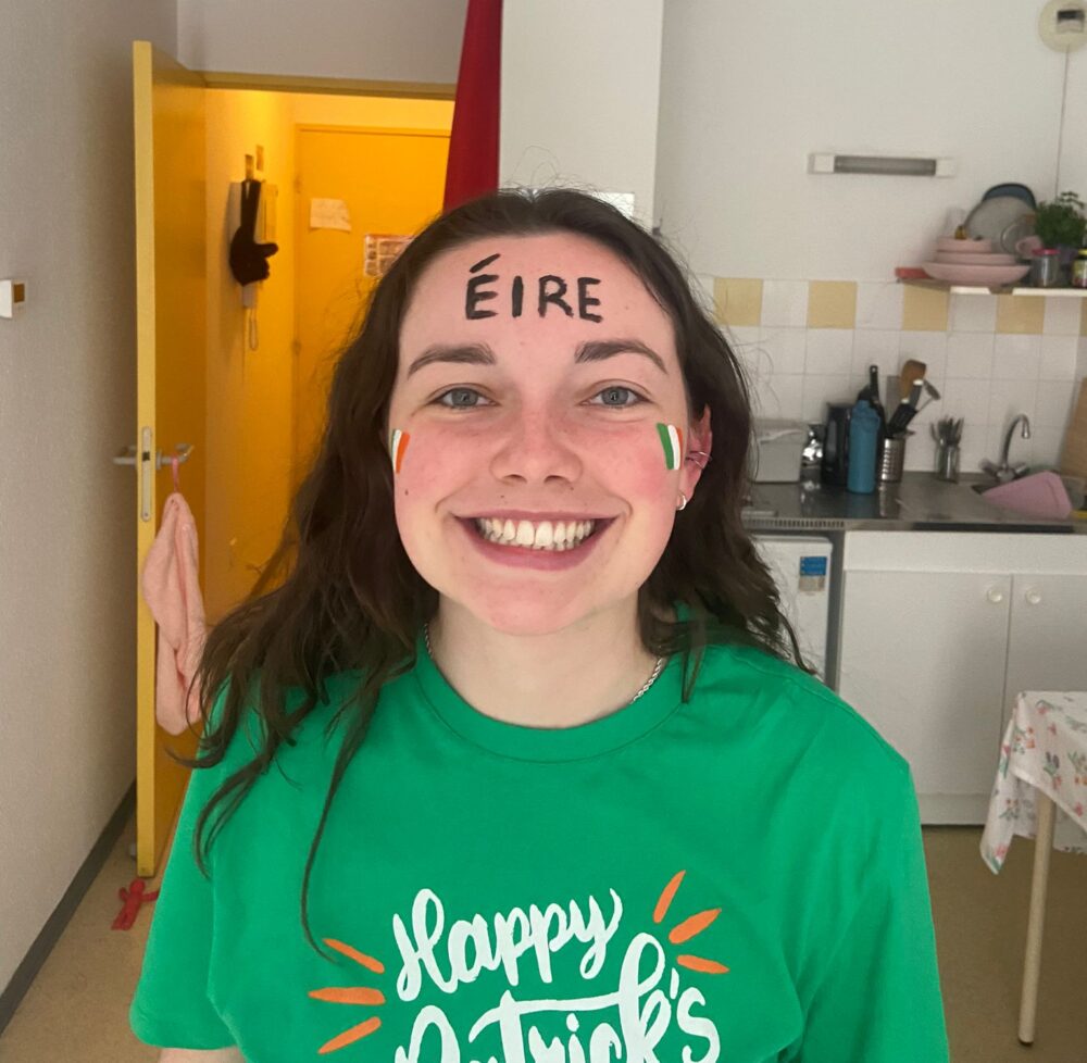 Kate smiling in St Patrick's day attire