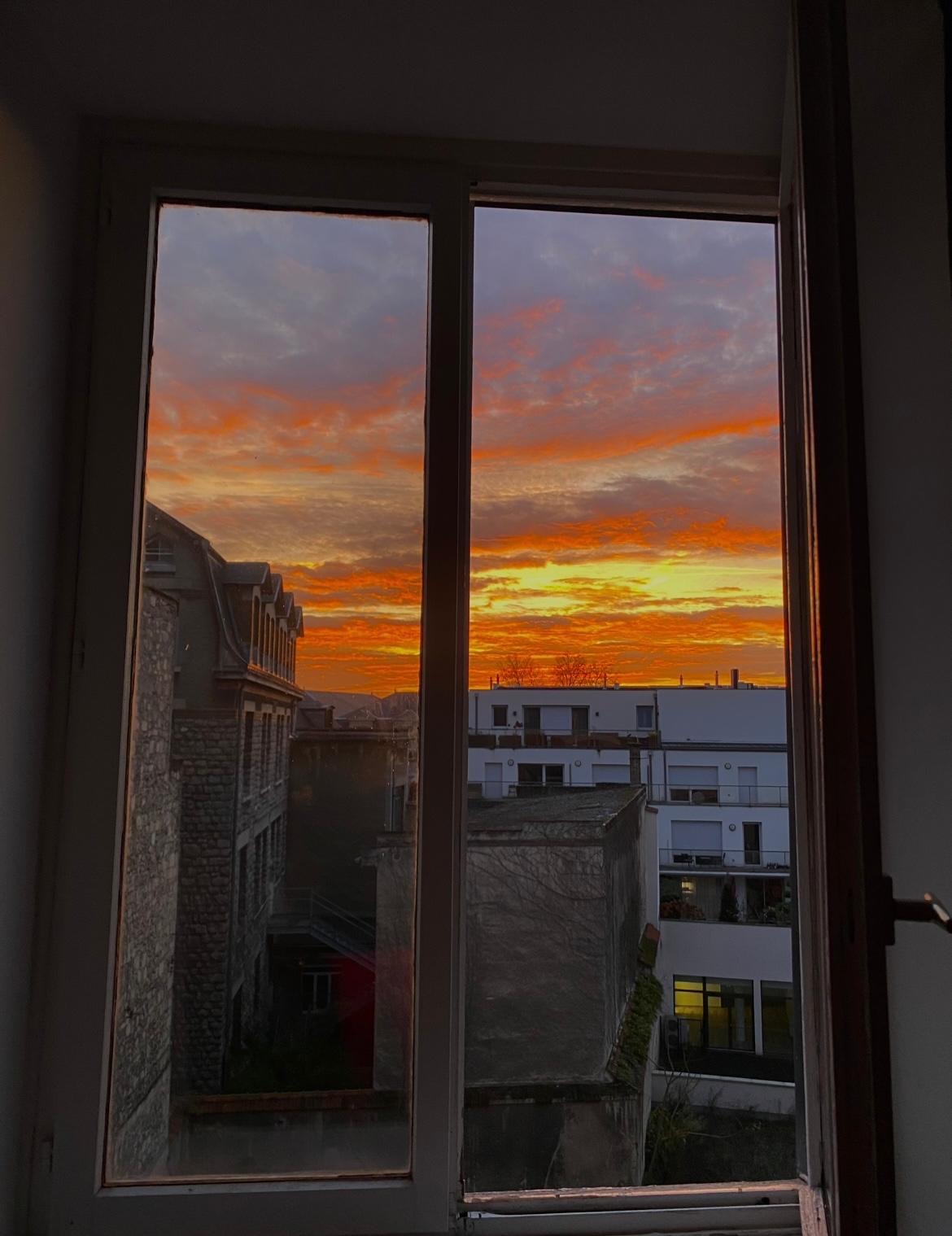Sunsets from our apartment in the city