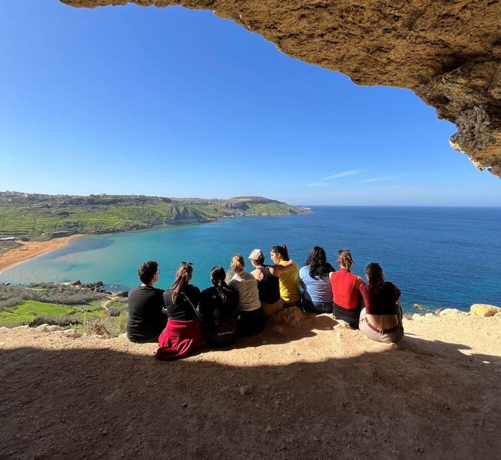 Enjoying the view from Mixta Cave after a hike